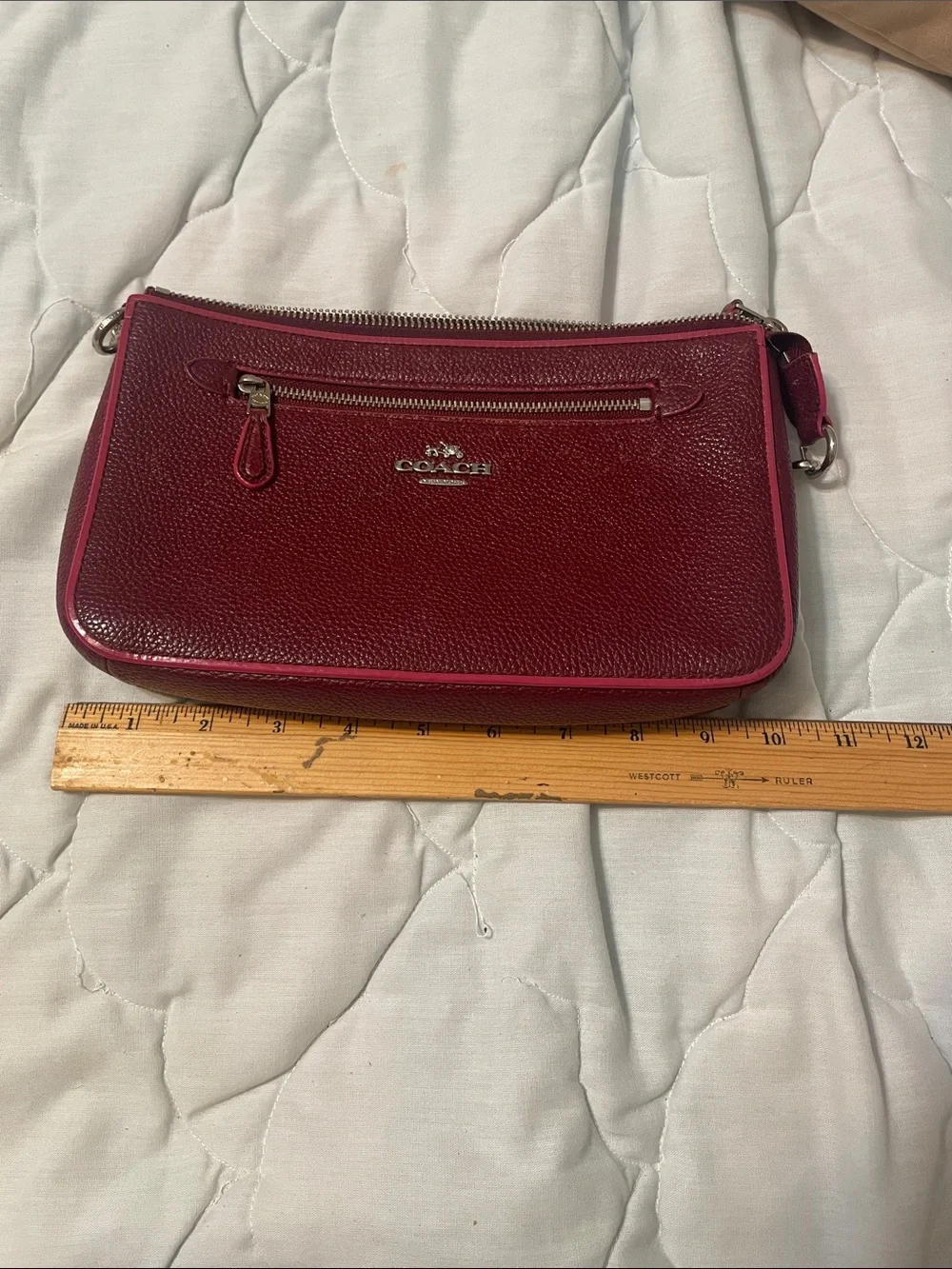Coach Nolita 24 wristlet pebbled leather burgundy/oxblood